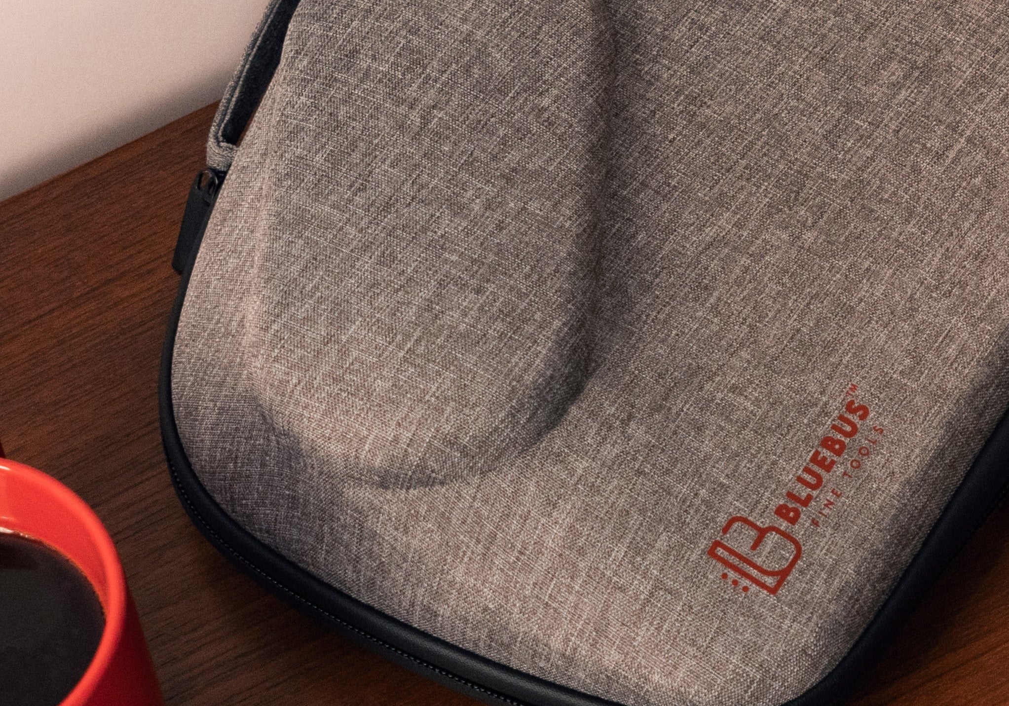 Recycled polyester (rPET) fabric — the woven shell of the BLAZE carrying bag, with the red BlueBus Fine Tools logo.